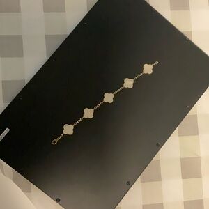 Elegant Gold and White Floral Bracelet